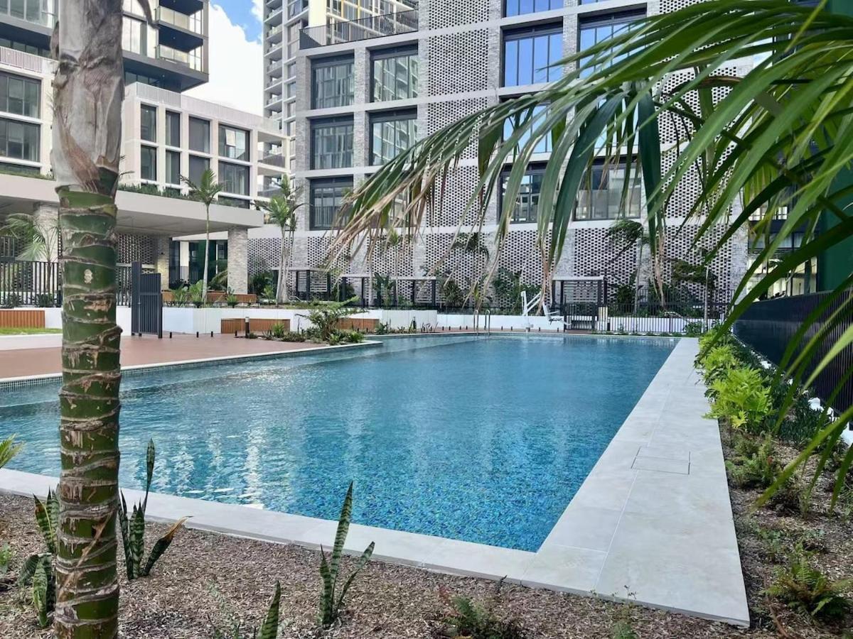 Spacious Pool View Apt In Olympic Park Sydney